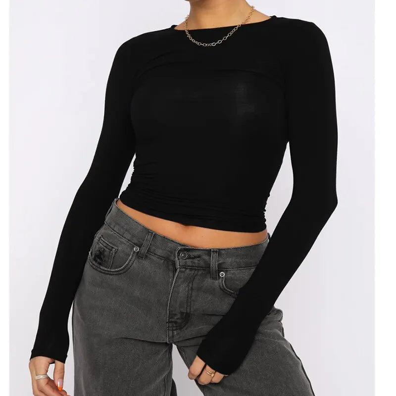 Women Autumn Slim Cropped Tops Solid Color Round Neck Long Sleeve ShowSPECIFICATIONSPattern Them: Classic StyleSleeve Style: regularSleeve Length(cm): shortBrand Name: otherPattern Type: SolidItem Type: topsCollar: O-NeckClothing Lengt